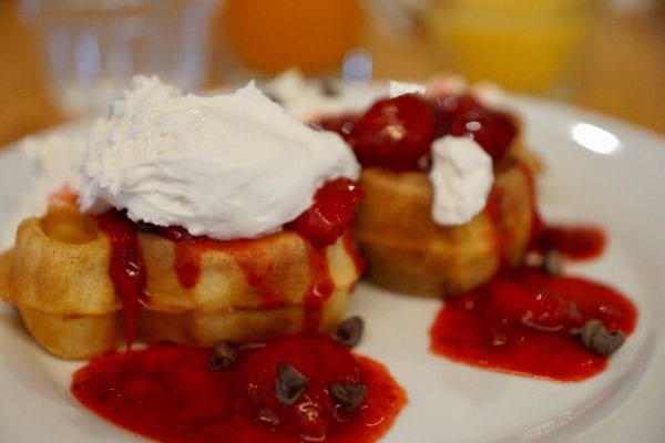 Cape May Cafe Character Breakfast Review mickey waffles strawberries and whipped cream low close