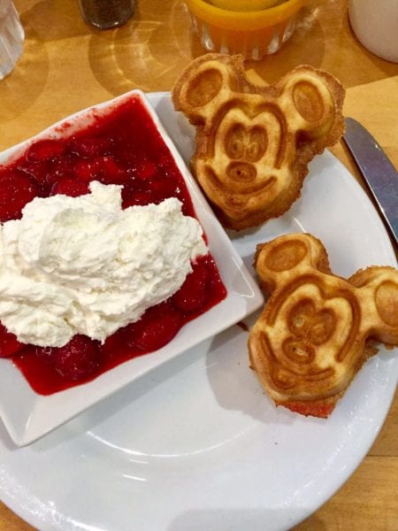 Cape May Cafe Breakfast Review mickey waffles strawberries and whipped cream top view