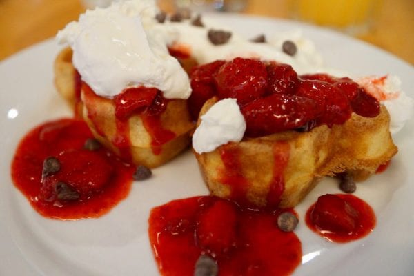 Cape May Cafe Breakfast Review mickey waffles strawberries and whipped cream close