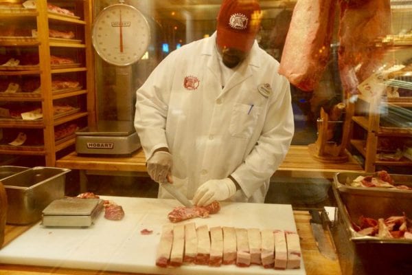 Yachtsman Steakhouse Full Review butcher cutting steaks