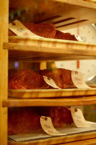 Yachtsman Steakhouse Full Review steaks on meat rack 2