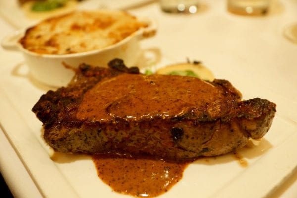 Yachtsman Steakhouse Full Review new york strip steak and potatoes gratin 2
