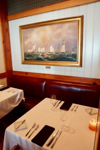 Yachtsman Steakhouse Full Review booth with yacht painting
