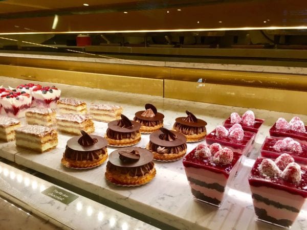 Les Halles Boulangerie Patisserie Bakery Display Case Raspberry Mousse Cake and Chocolate Tarts