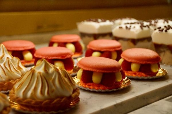 Les Halles Boulangerie Patisserie Bakery Display Case Raspberry Macarons and Lemon Tart